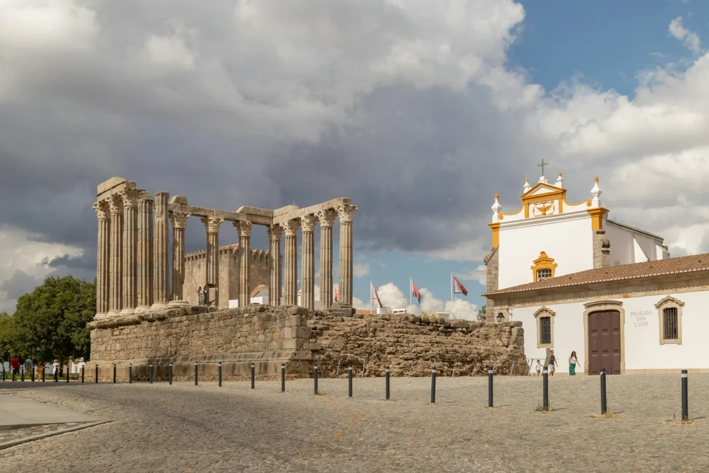 The Roman temple of Évora in the historic centre; the opening show itself takes place at Rossio de São Brás