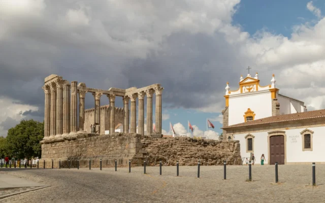 The Roman temple of Évora in the historic centre; the opening show itself takes place at Rossio de São Brás